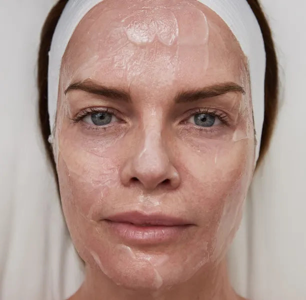 Woman with numbing cream applied before Morpheus8 treatment at Kate Somerville